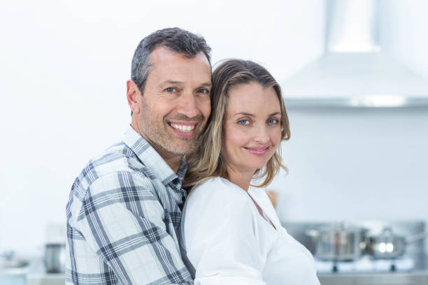 istock Pregnant couple in kitchen 840920262
