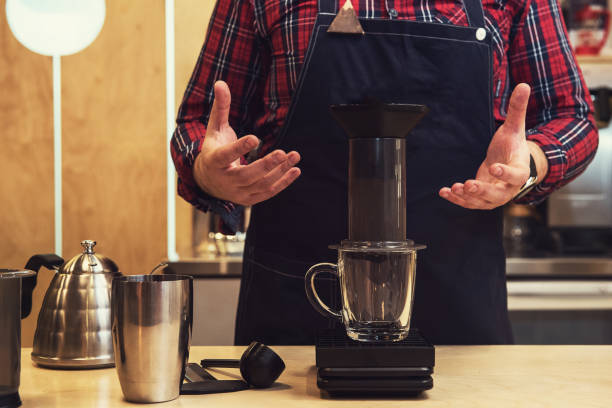 istock Barista brewing aeropress coffee 840923754