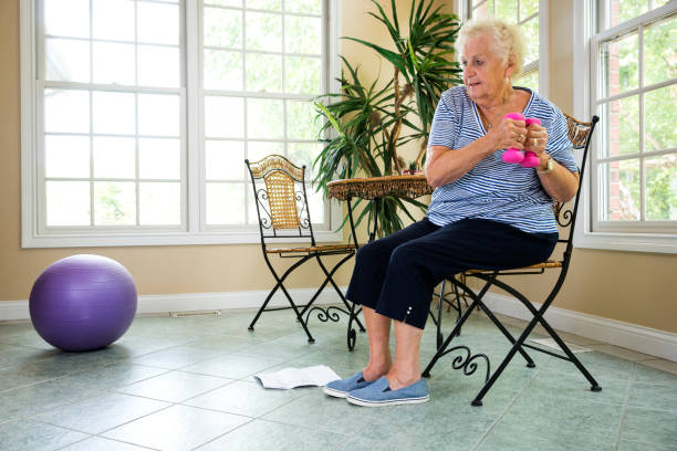Senior doing physical therapy exercises at home