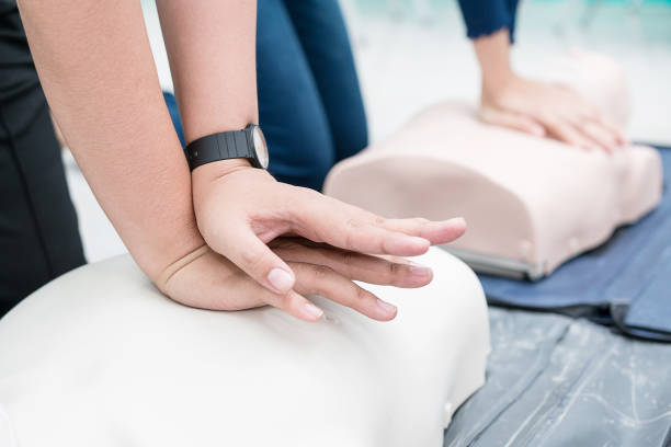 istock Nursing students are learning how to rescue the patient in emergency. CPR training with CPR doll. Closed-up. Soft focus. 840924198