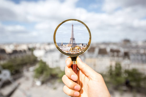 Cityscape view of Paris Looking on the Eiffel tower through the magnifying glass in Paris pompidou center stock pictures, royalty-free photos & images