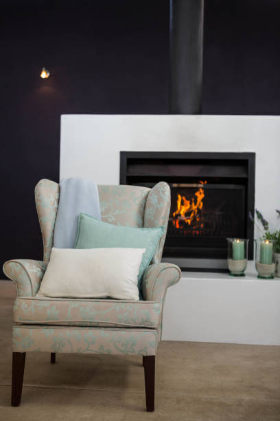 istock Armchair next to fireplace 840927966