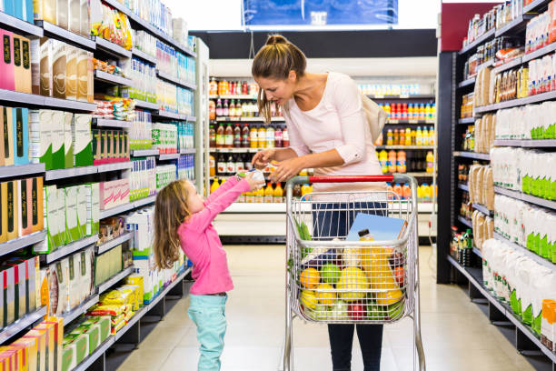 istock Mother and daughter doing shopping 840927976