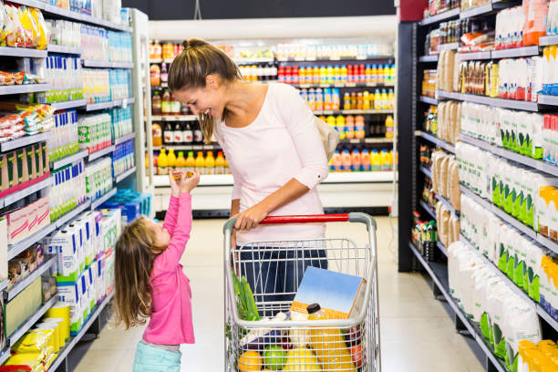 istock Mother and daughter doing shopping 840928008