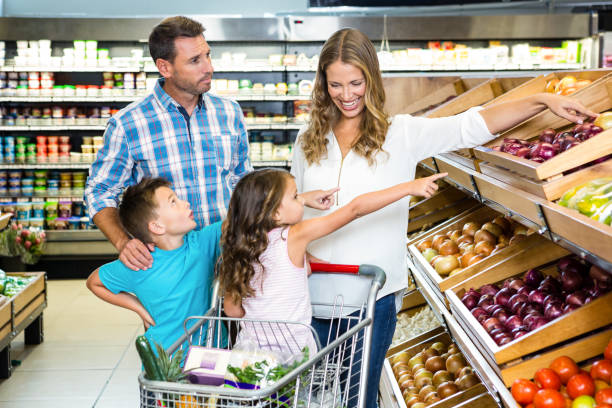 istock Happy family doing shopping 840930752