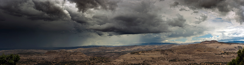 A panorama of dramatic summer monsoon thunderstorms near Capitol Reef National Park in Utah.