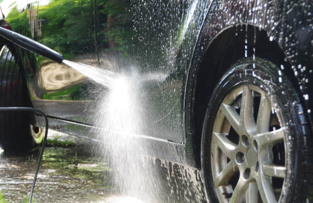 auto waschen  - washing water car cleaning stock-fotos und bilder