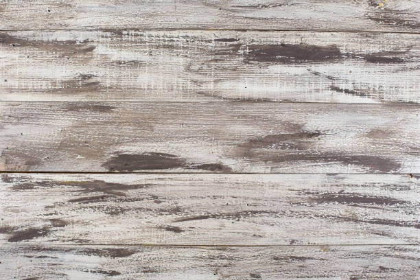 istock Black and white wooden background, top view 840939856