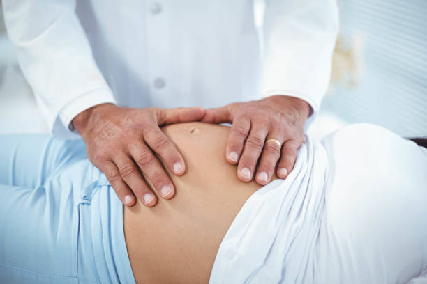 istock Doctor examining pregnant woman 840940384