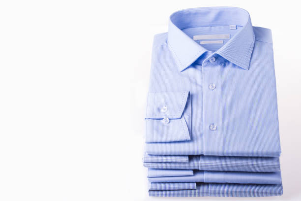 istock Men's shirts folded in a pack on a white background 840943888