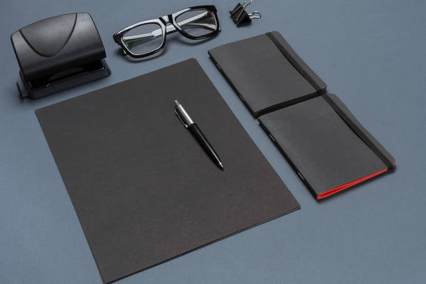 istock A set of black office accessories, glasses on gray background 840944650