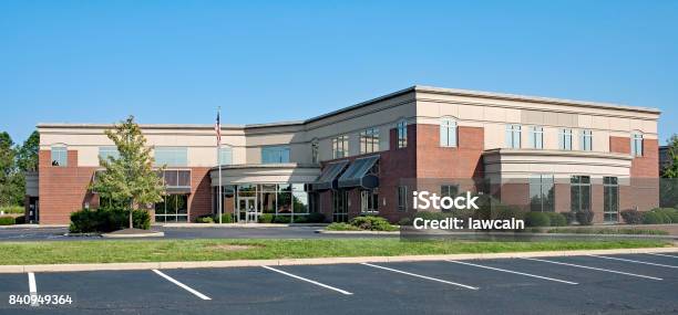 Red Brick Building With Concave Entrance Stock Photo - Download Image Now - Office Building Exterior, Parking Lot, Building Exterior