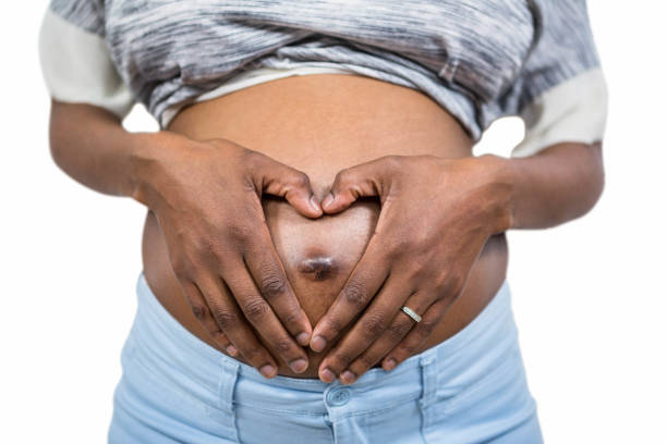 istock Pregnant woman touching her belly 840959722