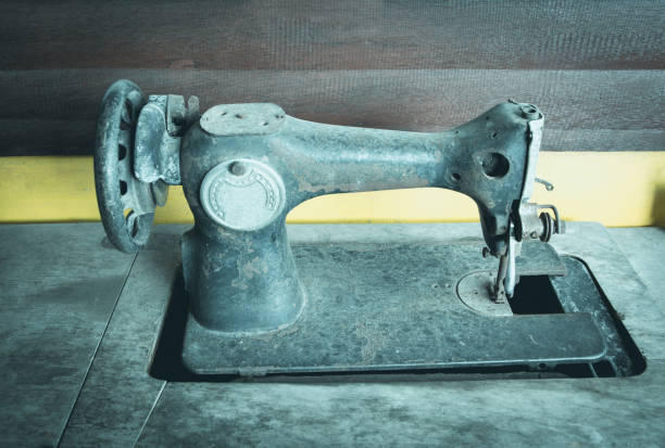 istock Old vintage hand sewing machine. Closeup the sewing machine, old sewing machine. 840959790