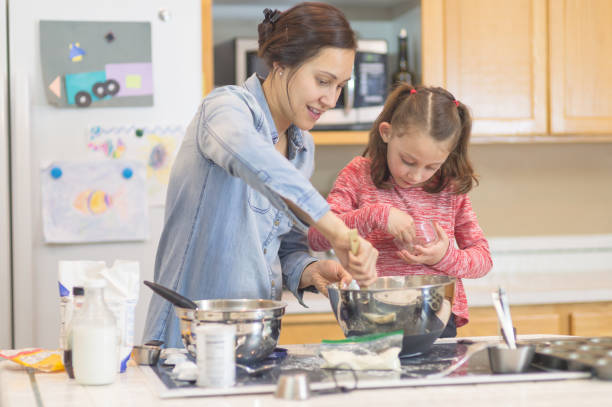 istock Mom and daughter baking day! 840961066