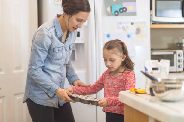 istock Mom and daughter baking day! 840961082