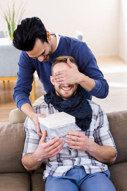 istock Gay man surprising his boyfriend 840964118