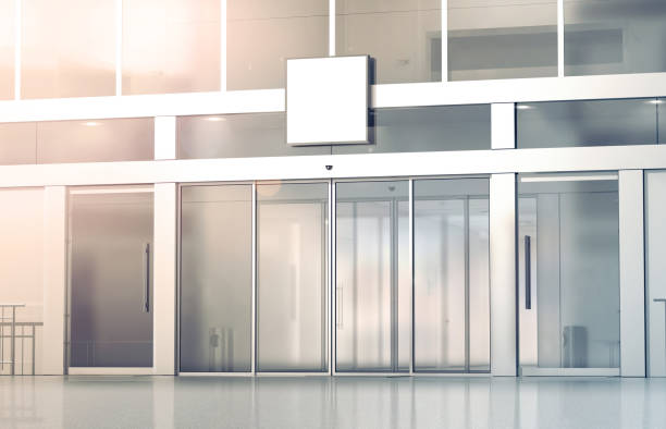 istock Blank white square signage mockup on store glass sliding doors 840964206