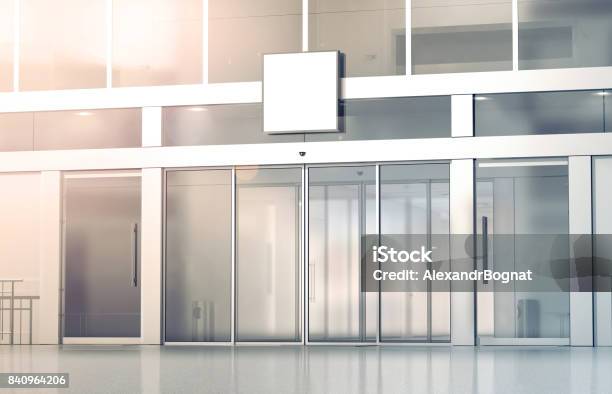 Blank White Square Signage Mockup On Store Glass Sliding Doors Stock Photo - Download Image Now
