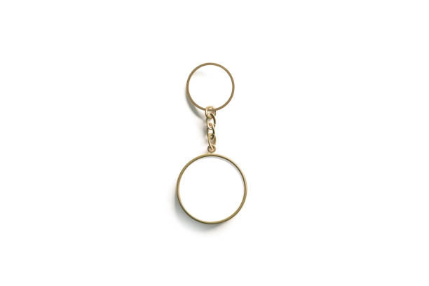 Blank gold round white key chain mock up isometric view Blank gold round white key chain mock up isometric view, 3d rendering. Clear golden circular keychain design mockup isolated. Empty plain keyring souvenir holder template. Steel circle trinket label keyring charm stock pictures, royalty-free photos & images