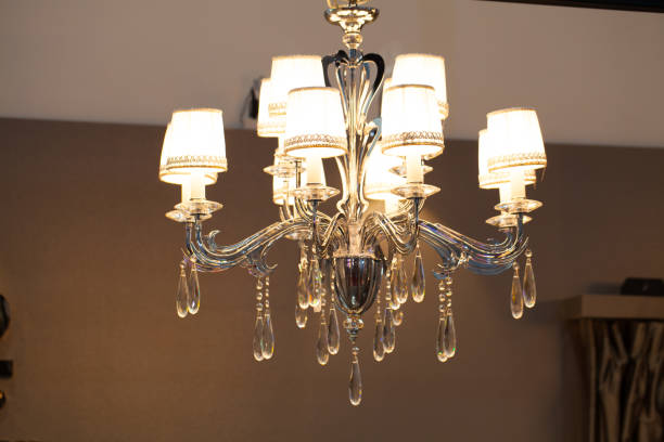 istock Beautiful chandelier. luxury expensive chandelier hanging under ceiling 840964738