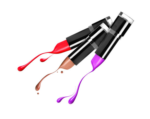 istock Melting lipsticks with falling drops down close-up, isolated on white background 840974554