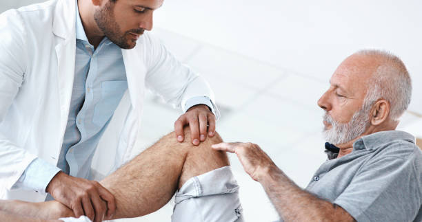 istock Senior man having medical exam. 840979628