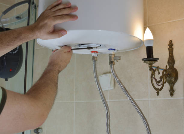 istock Repairing a boiler with a wrench 840990724