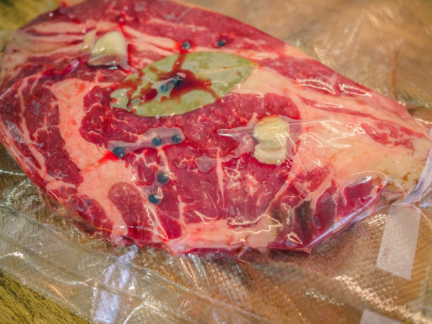 istock Bag with meat and spices prepared for vacuum packaging and cooked at low temperature 840998350