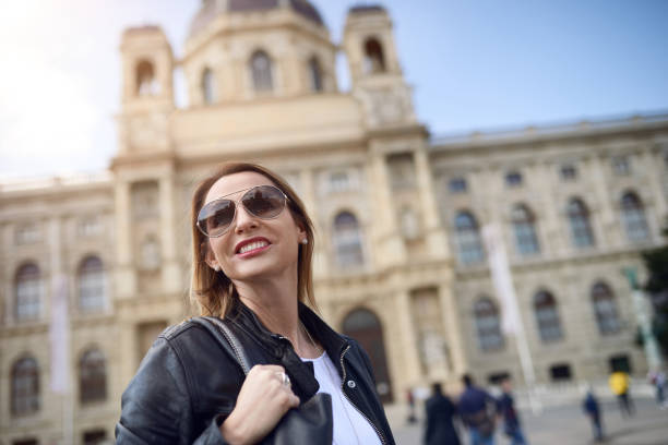 istock Attractive smiling woman in sunglasses 841001802