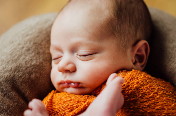 istock beautiful newborn sleeping baby boy 841012412