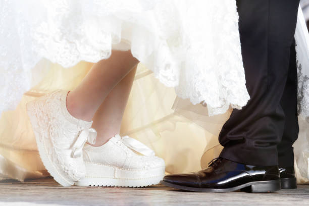 istock Feet of Wedding Couple 841040318