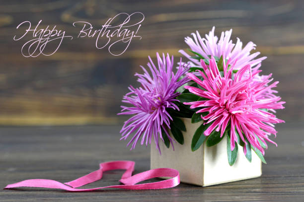 istock Happy Birthday card with flowers arranged in gift box 841040800