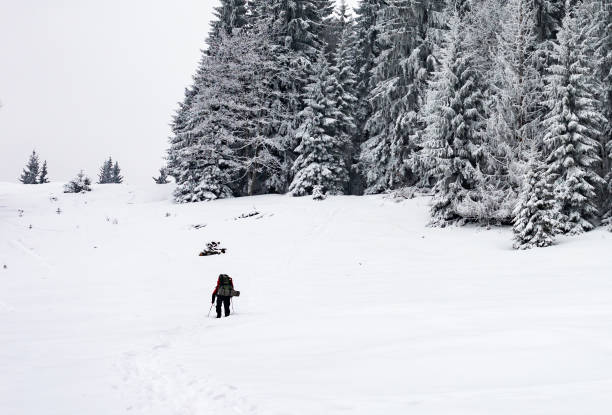 istock Winter landscape with man hiking. 841044482