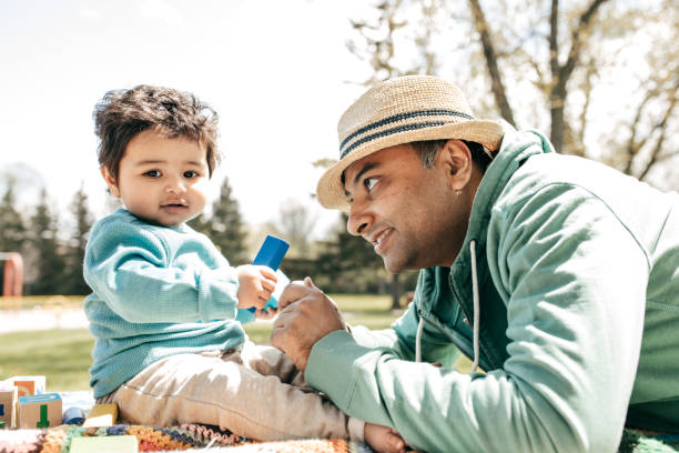 istock Father and baby in the park 841044610