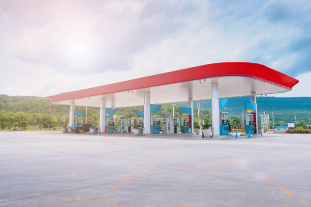 istock Gas fuel station with clouds in the sky and sun light 841044836
