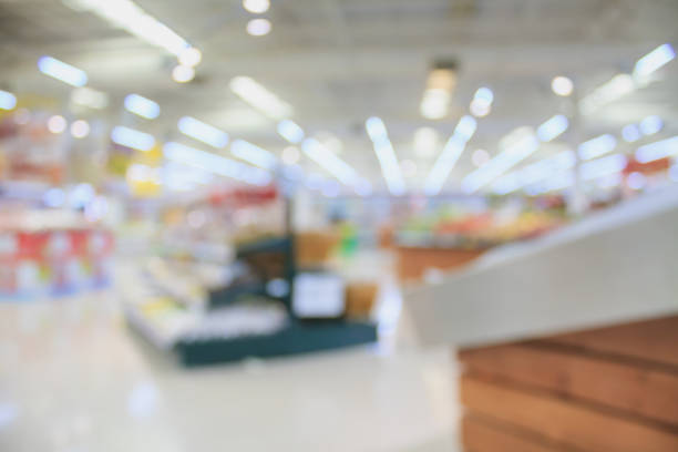 istock Supermarket with fresh food abstract blurred background with bokeh light 841044868