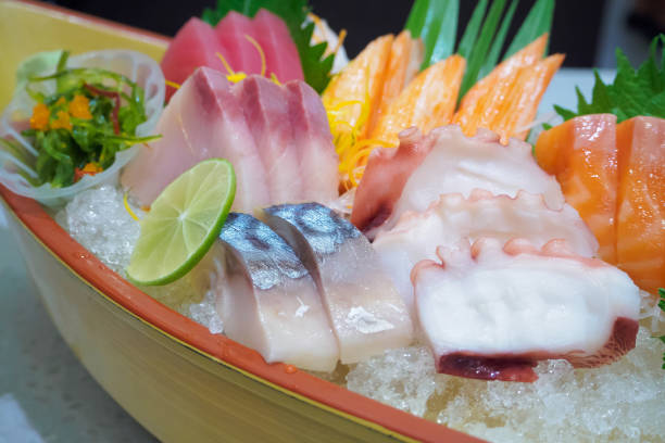 istock japanese sashimi set on boat plate 841044906