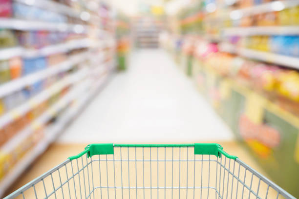 istock Abstract Supermarket aisle with empty shopping cart 841045002