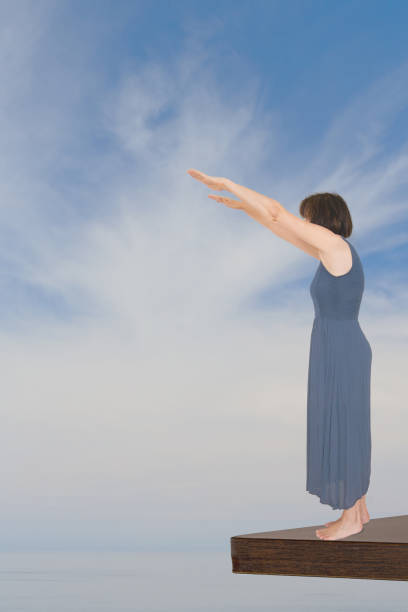 istock Woman taking the plunge - concept, metaphor. 841048864