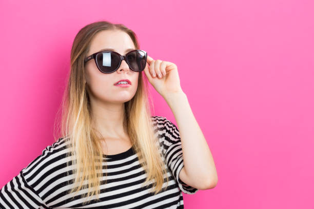 istock Young woman with sunglasses 841050696