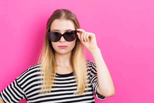 istock Young woman with sunglasses 841050704