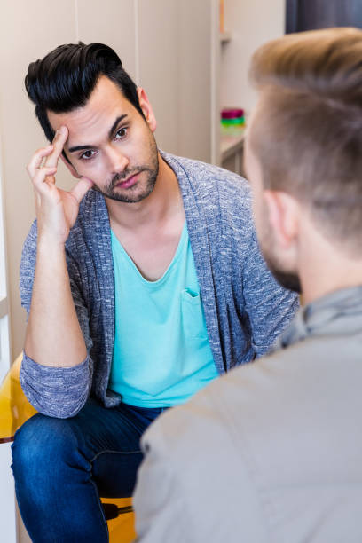 istock Thoughtful gay couple talking 841054594