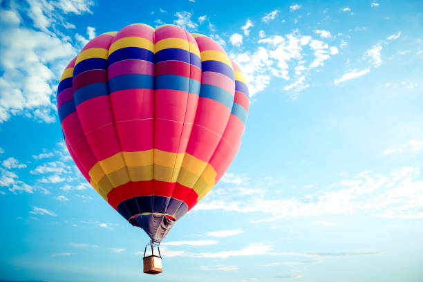 colorful hot air balloon Colorful hot air balloon flying on sky. travel and air transportation concept - balloon carnival in Thailand ballooning festival stock pictures, royalty-free photos & images