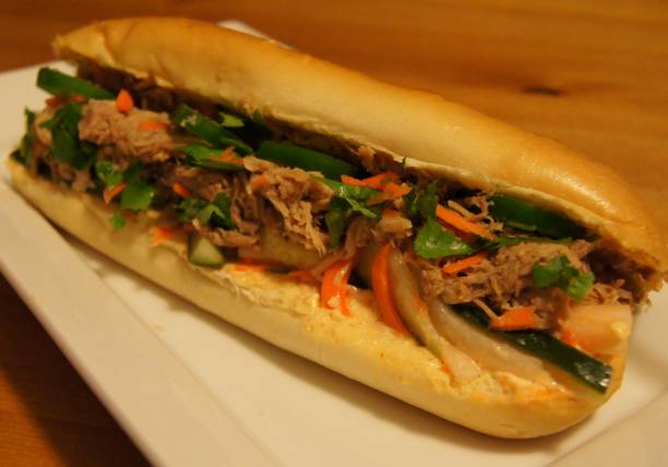 istock Colorful Banh Mi Sandwich Displayed on White Plate 841064892