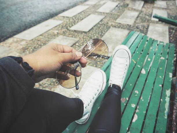 istock Selfie of sneakers with sun glasses 841065534