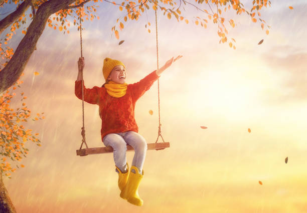 istock child under the autumn shower 841079086
