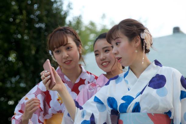 istock Japamnese young women in Yukata Taking selfie 841079978