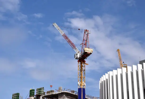 Crane is working on construction site background