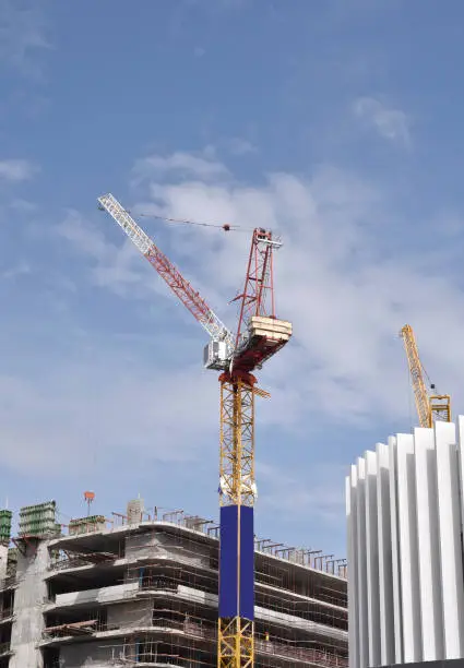 Crane is working on construction site background